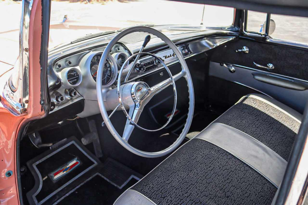 Pink 1957 Chevrolet Bel Air showing a clean restored finish